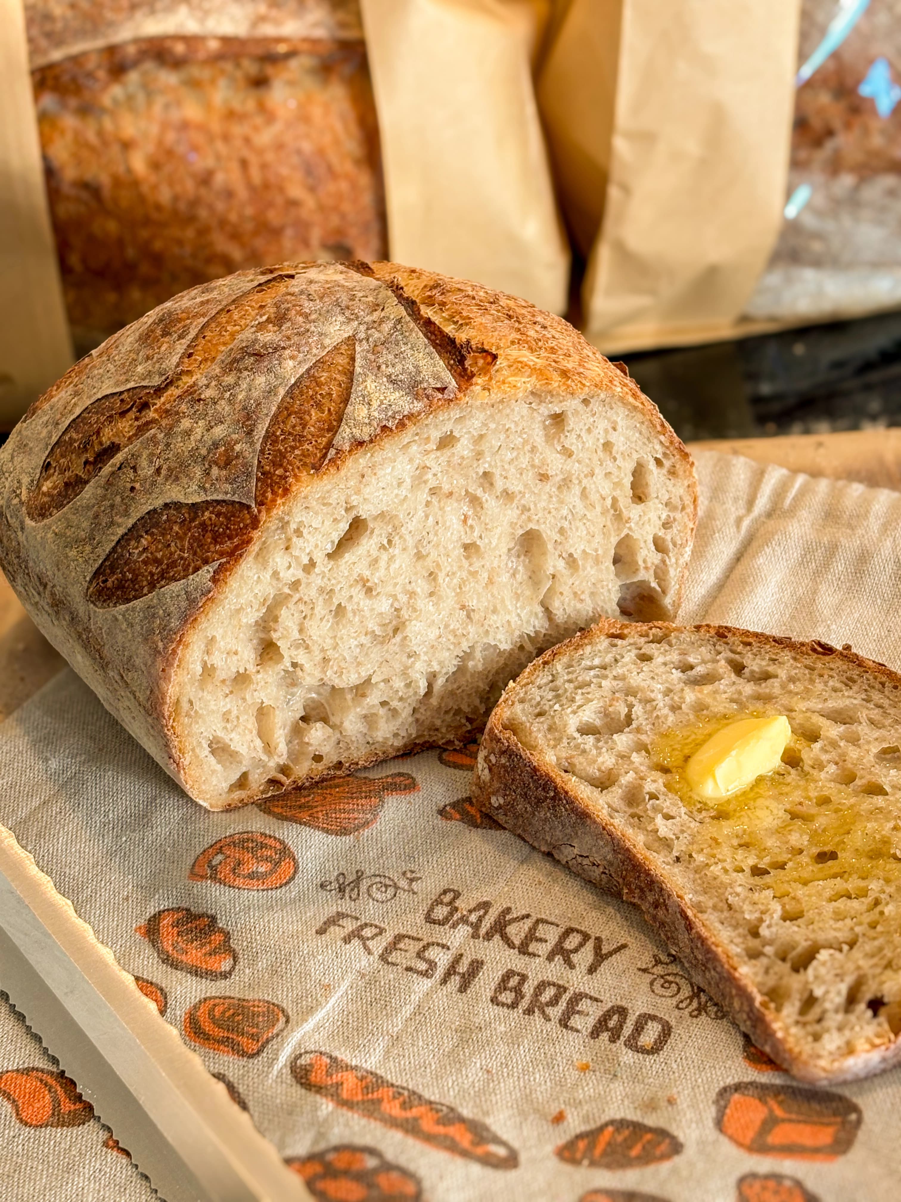 A thick slice of sourdough with melting butter